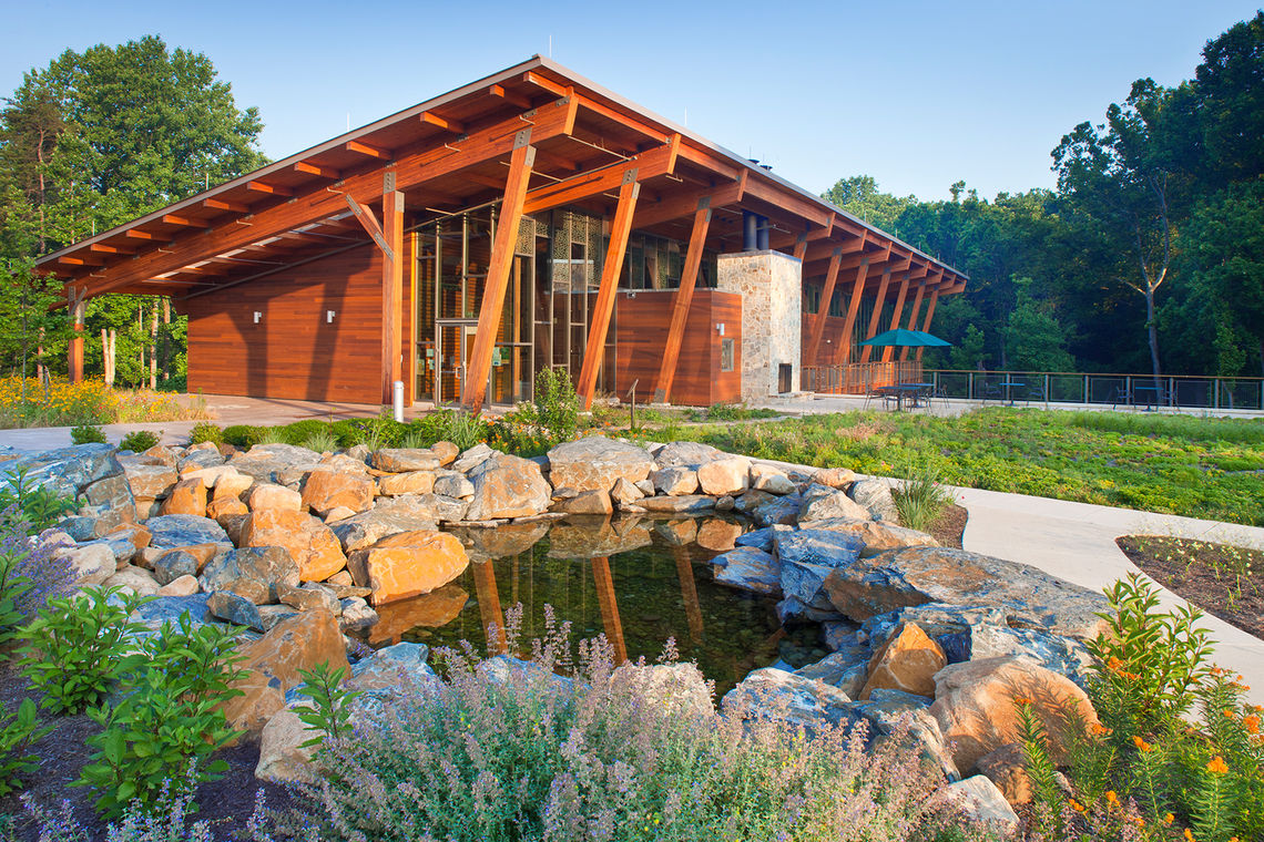 Visitors to the Robinson Nature Center are immediately afforded a view of the center and a clear directional understanding as they enter the site and turn into the parking lot.